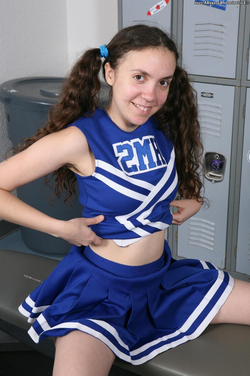20P Pretty cheerleader Cameron 5 strips naked & spreads her hairy pussy up close