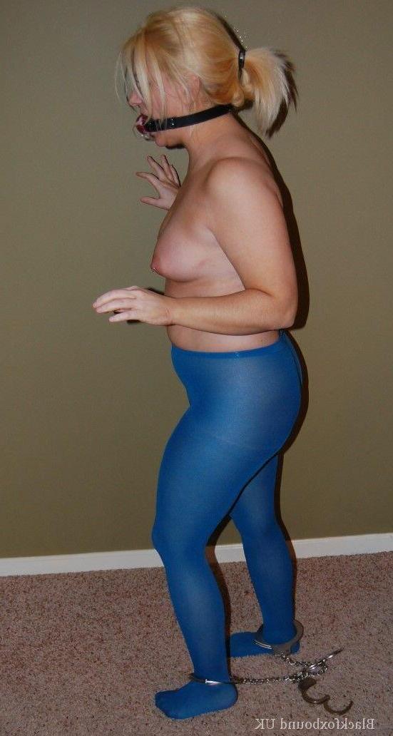 11P Chubby blonde is hogtied with handcuffs while topless in blue hose and gagged