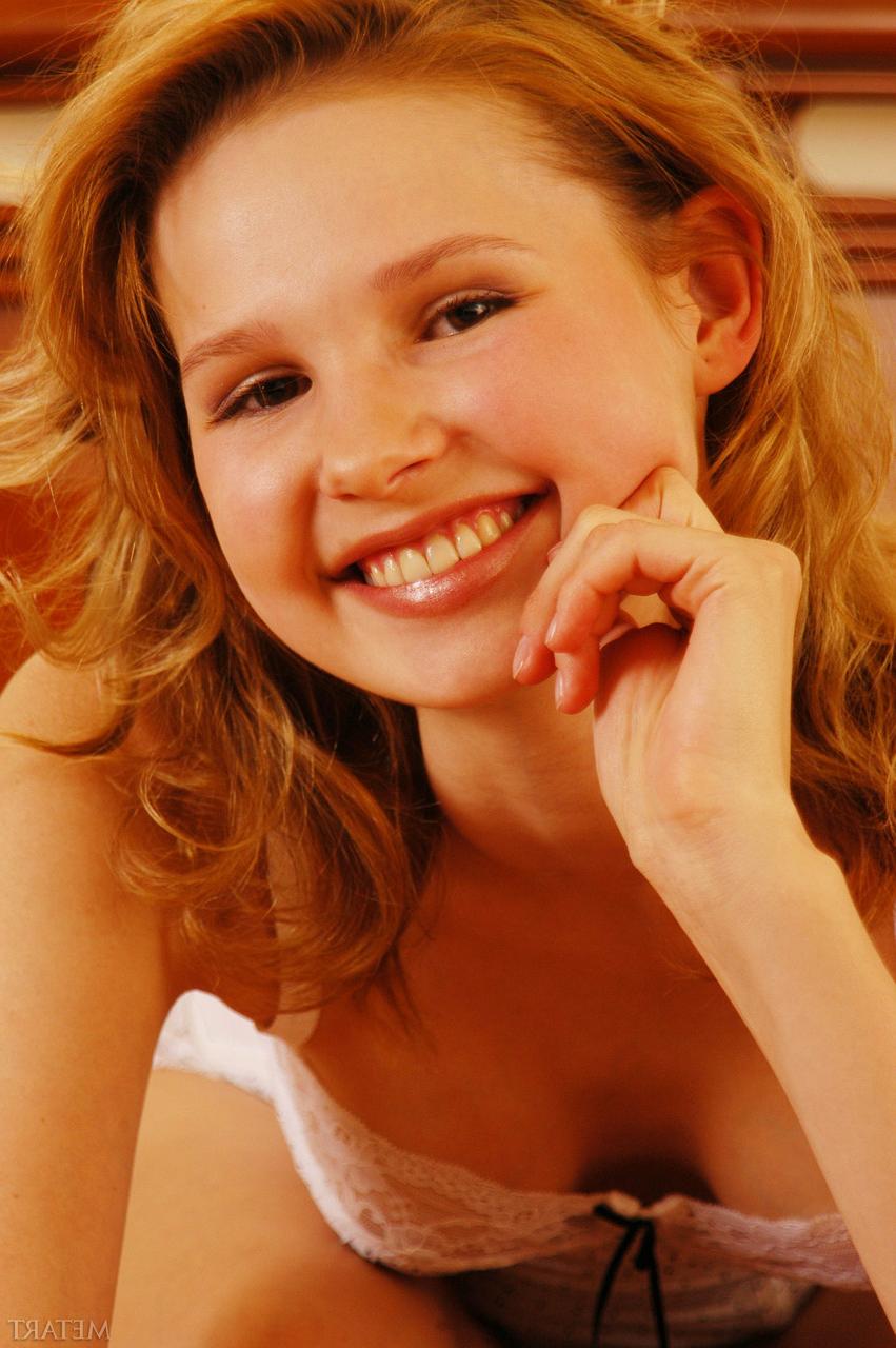20P Slender American babe Tatum A posing in her white lingerie and heels