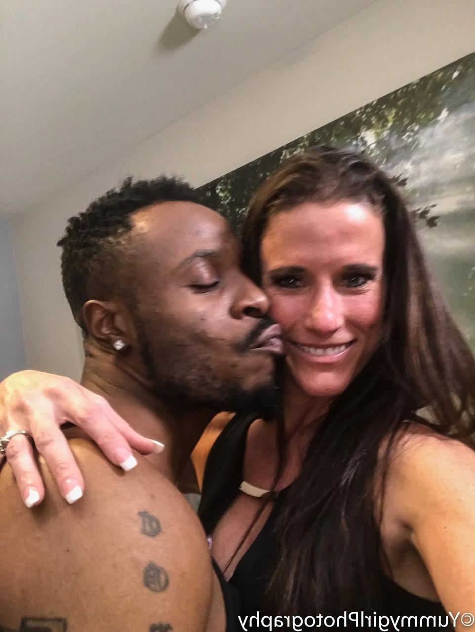 20P Tall MILF Sofie Marie takes a photo of herself blowing a big black dick