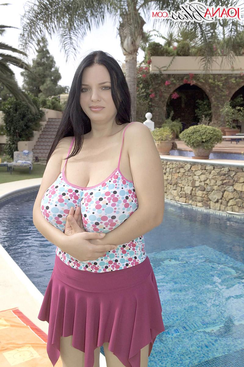 16P Solo model Joana Bliss unleashes her giant boobs by a pool in cute panties