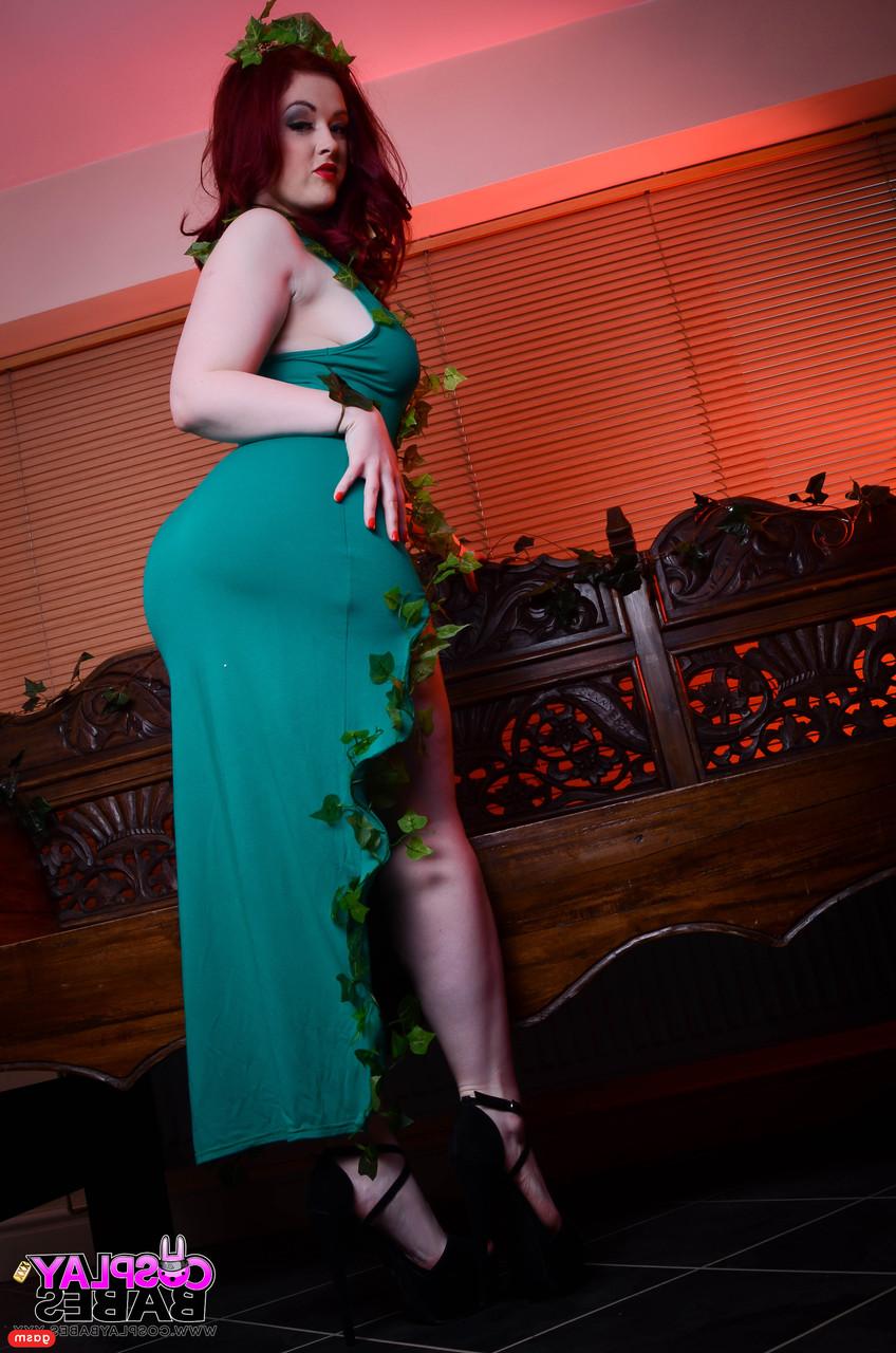 15P Voluptuous redheaded babe Jaye Rose teases with her big tits & ass