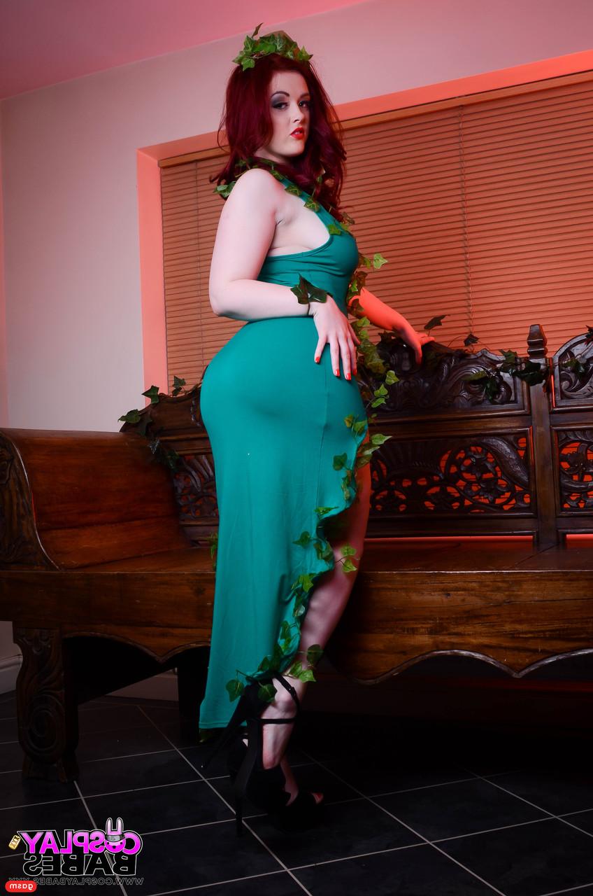 15P Voluptuous redheaded babe Jaye Rose teases with her big tits & ass