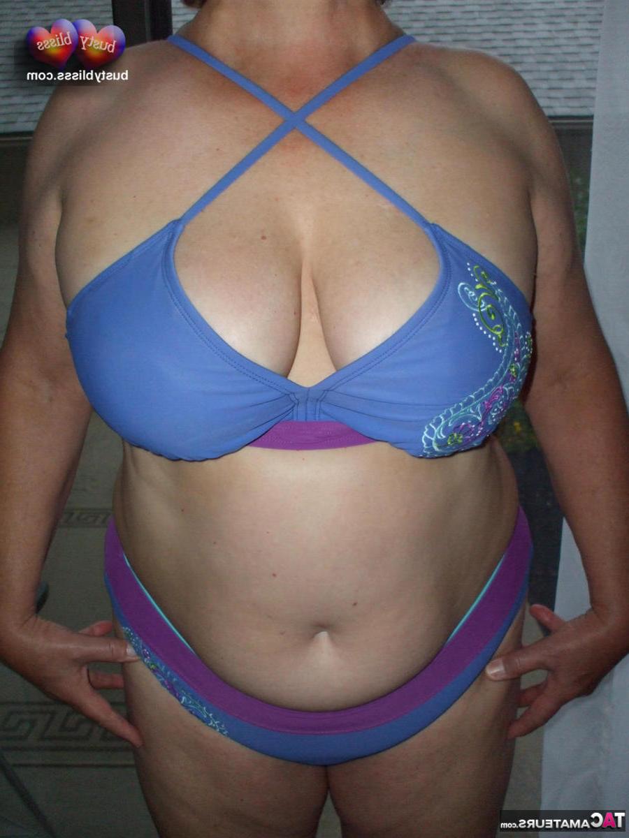 16P Older lady Busty Bliss frees her natural tits before pulling down her panties
