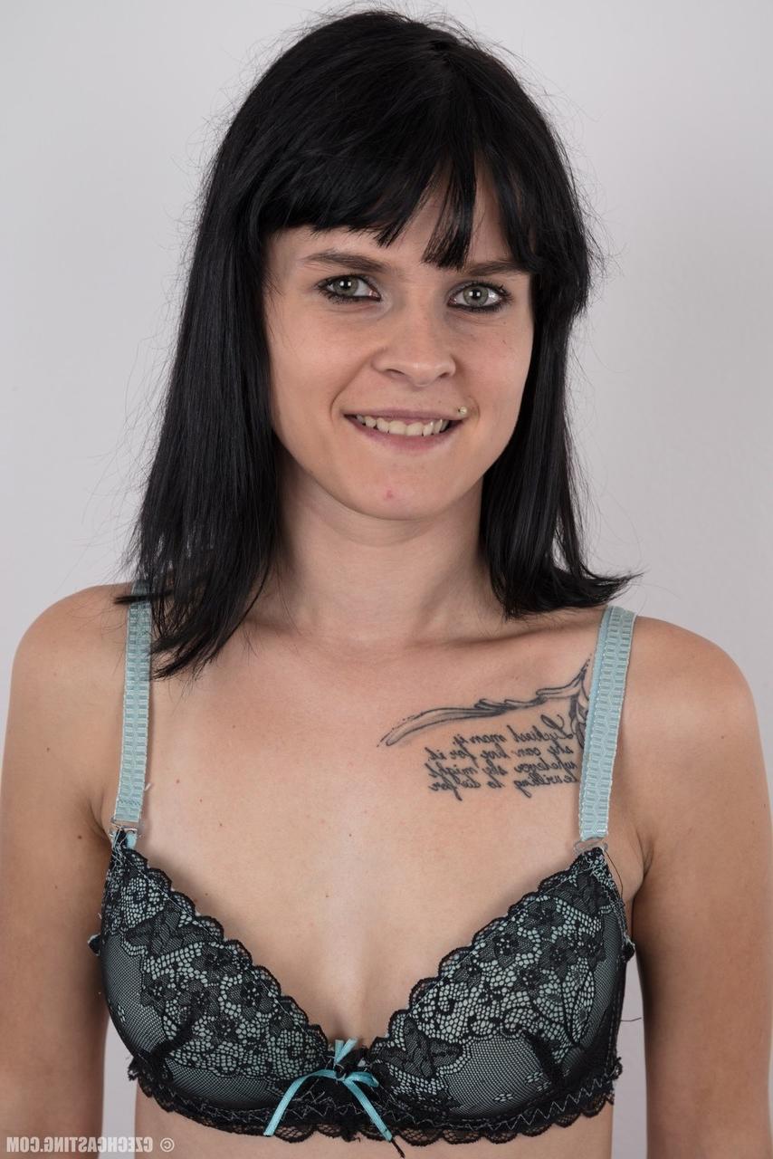20P Burnett amateur models fully clothed before a close-up of her naked pussy