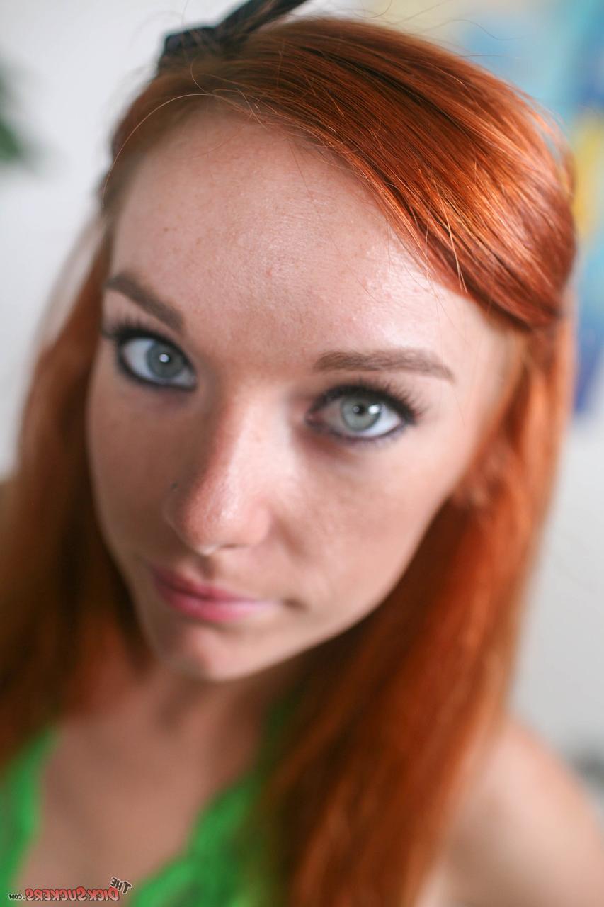 15P Petite redhead strips naked before sporting a mouthful of cum after a blowjob