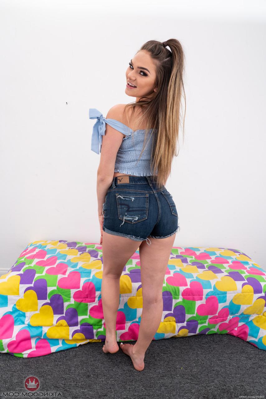 20P Ponytailed babe Athena Faris shows off her big ass & her lickable shaved pussy
