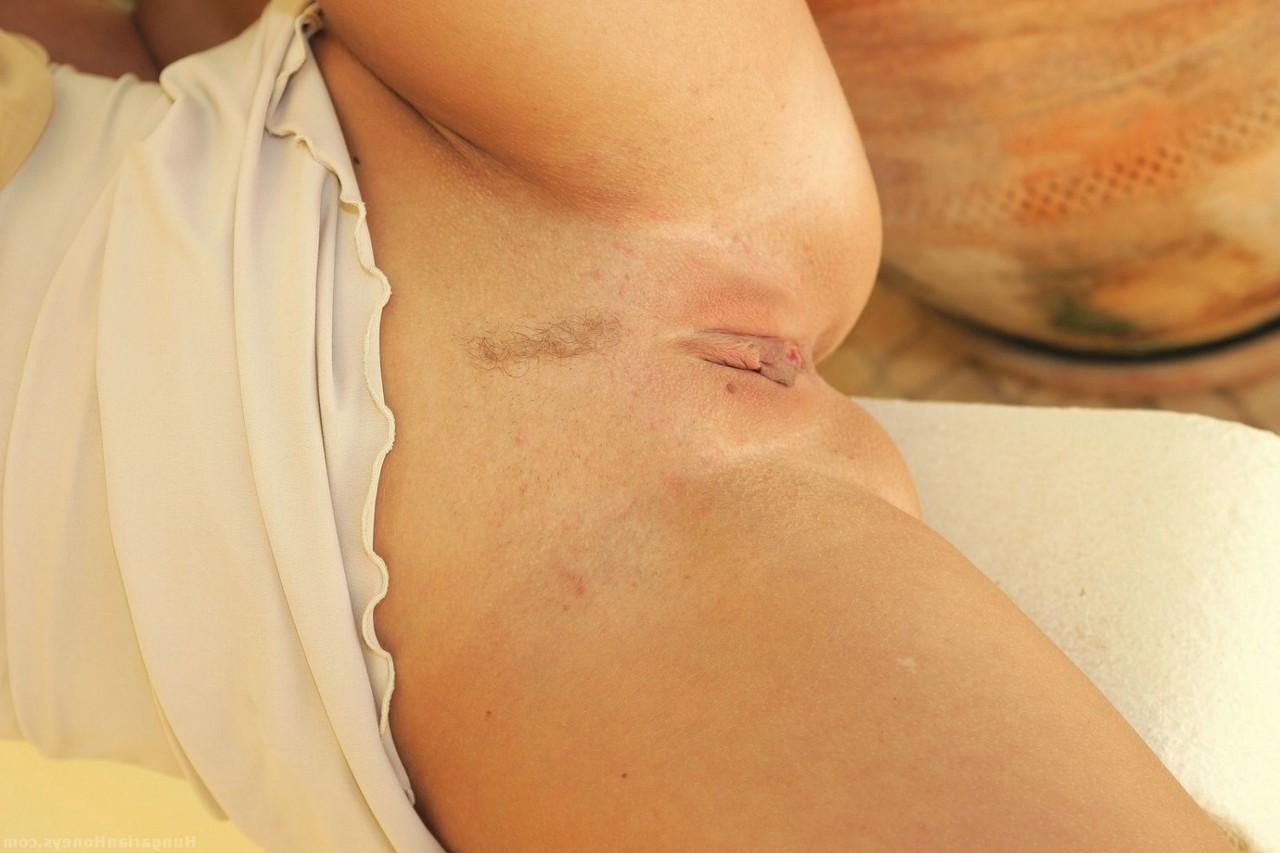 20P Ponytailed Czech MILF Veronika Simon shows her big ass and her trimmed pussy