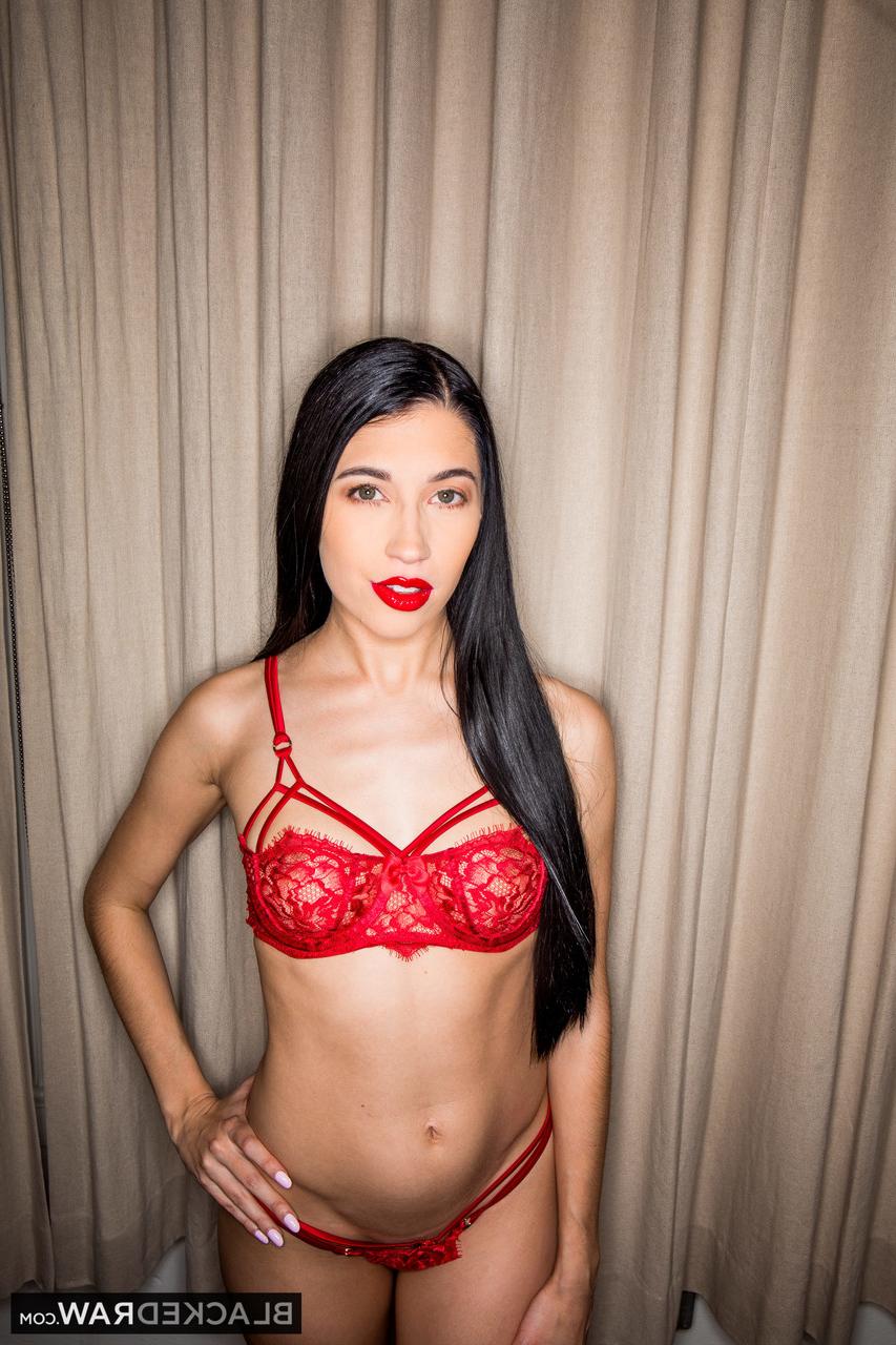 20P Dark haired hottie Pressure doffs her red outfit & takes two huge black dicks