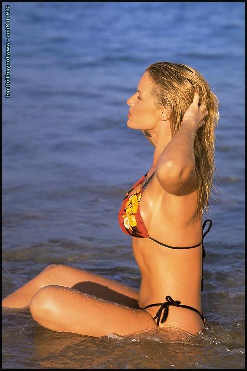 15P Fitness model Tonya Elliott poses in swimwear while at the beach