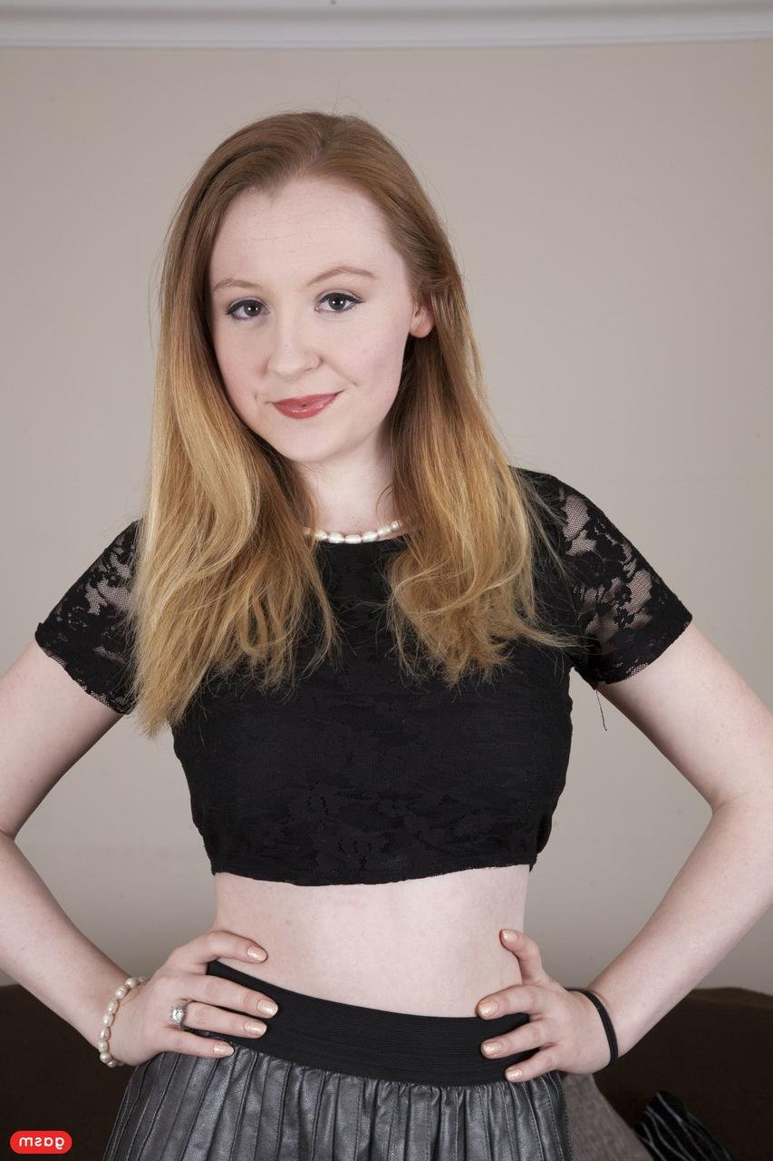 15P Hot redheaded teen Ruby Temptations unveils her big tits & rubs her muff