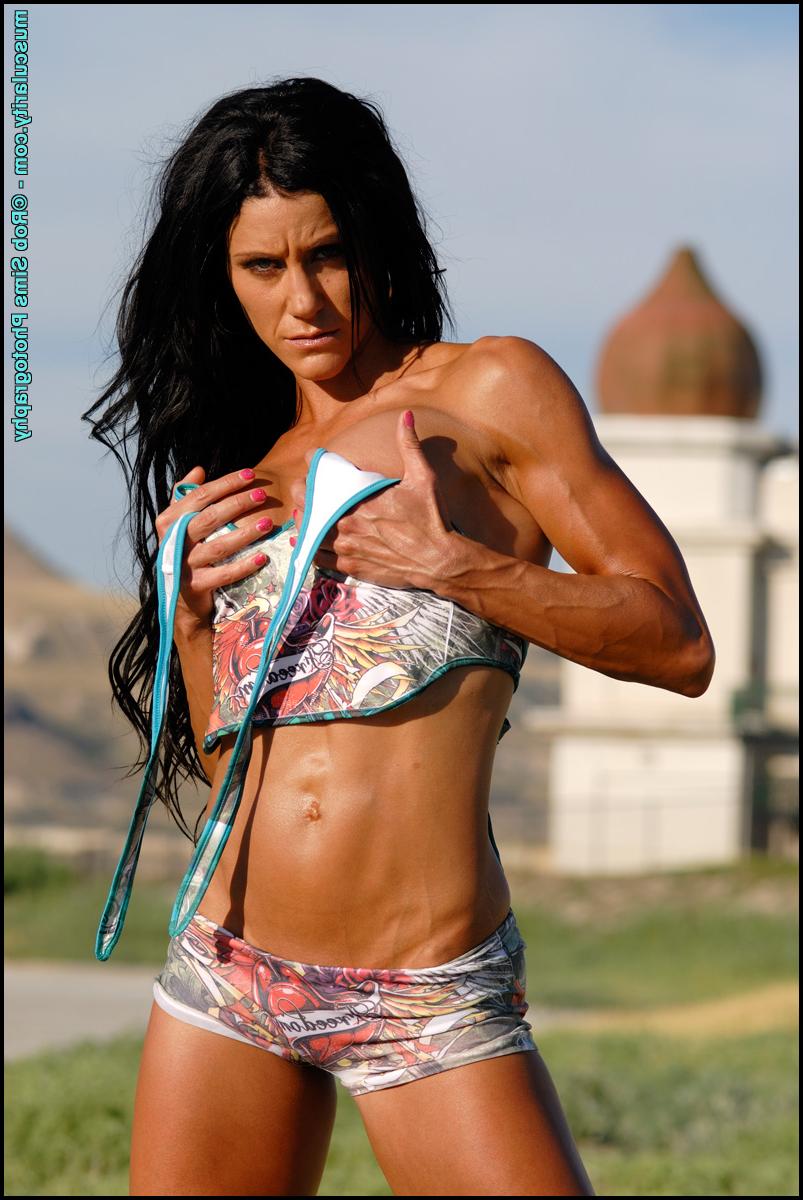 15P Brunette bodybuilder Shandi Matik poses in beachwear while outdoors