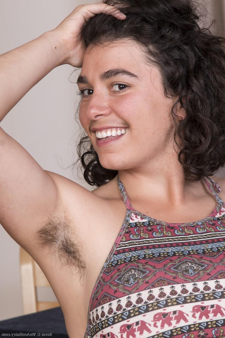18P Dark haired babe with big tits Serai teasing her hairy vagina in a solo
