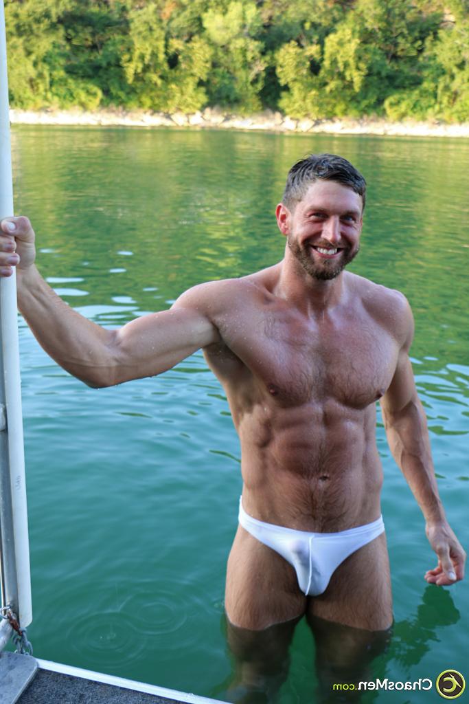 20P Gay brunette bodybuilder Zane poses in his sexy undies & unveils his huge dick