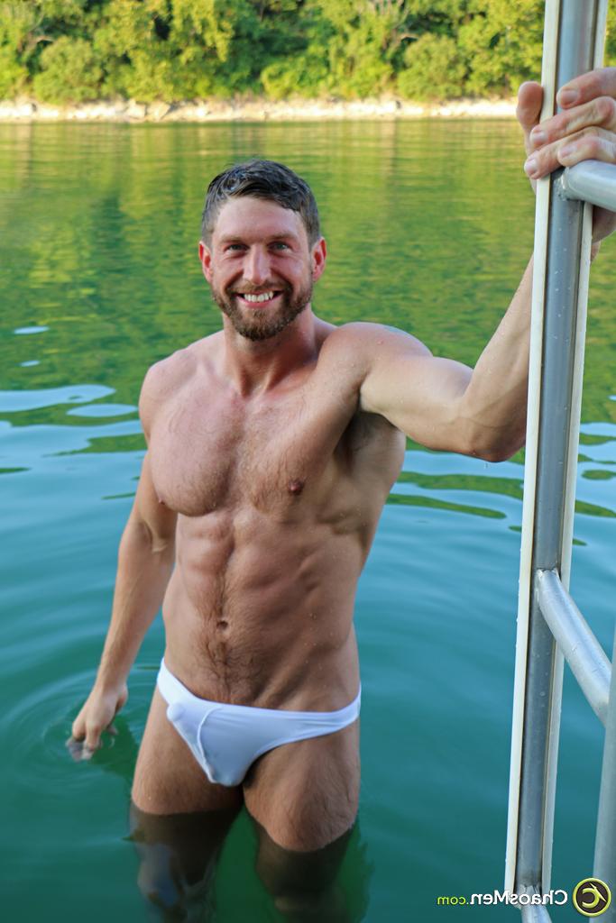 20P Gay brunette bodybuilder Zane poses in his sexy undies & unveils his huge dick