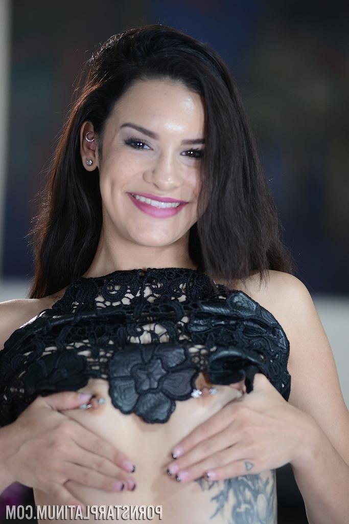 12P Solo model Eden Sin sheds denim shorts and a thong to pose in the nude