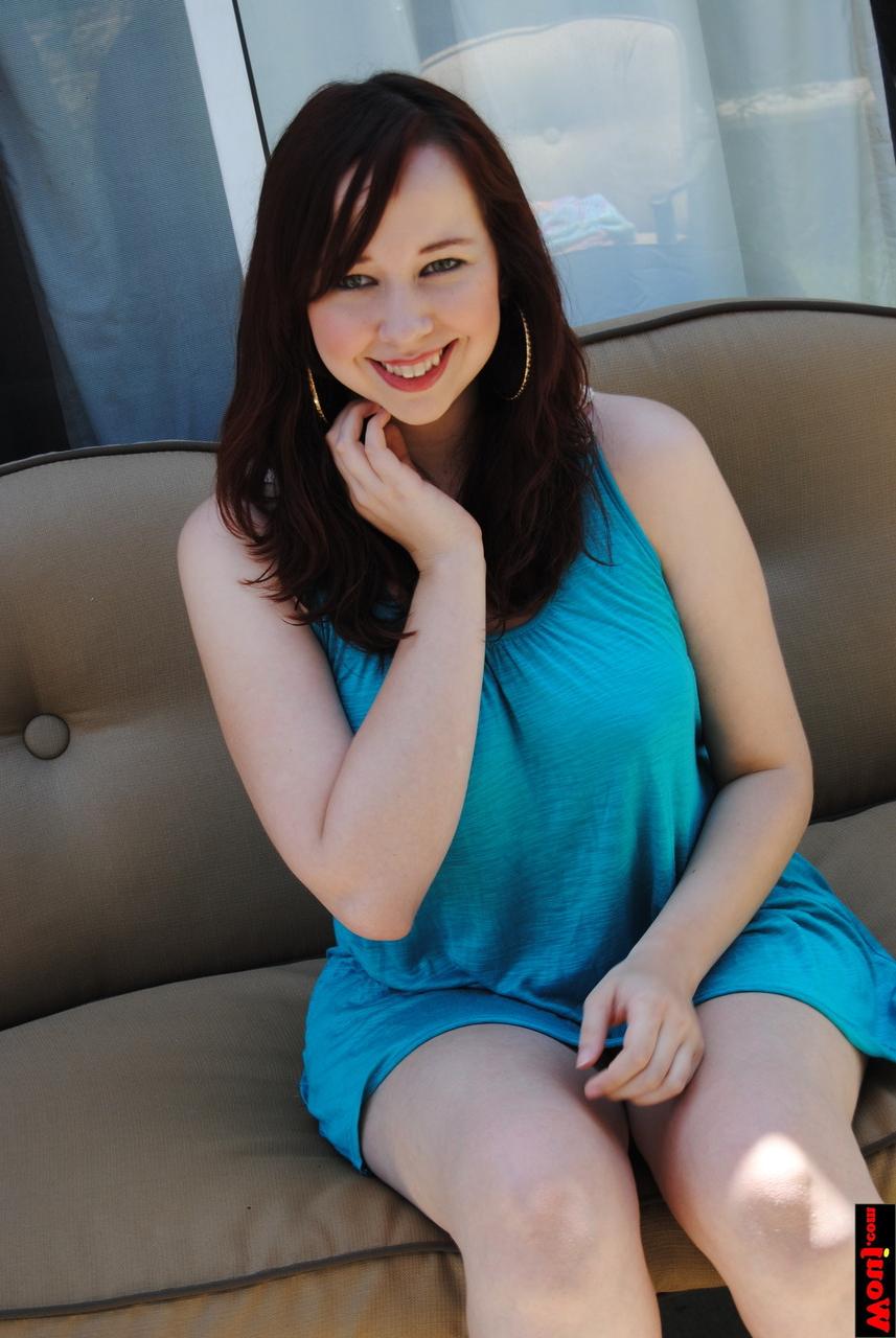 15P Chubby brunette amateur posing in her gorgeous blue dress on the sofa
