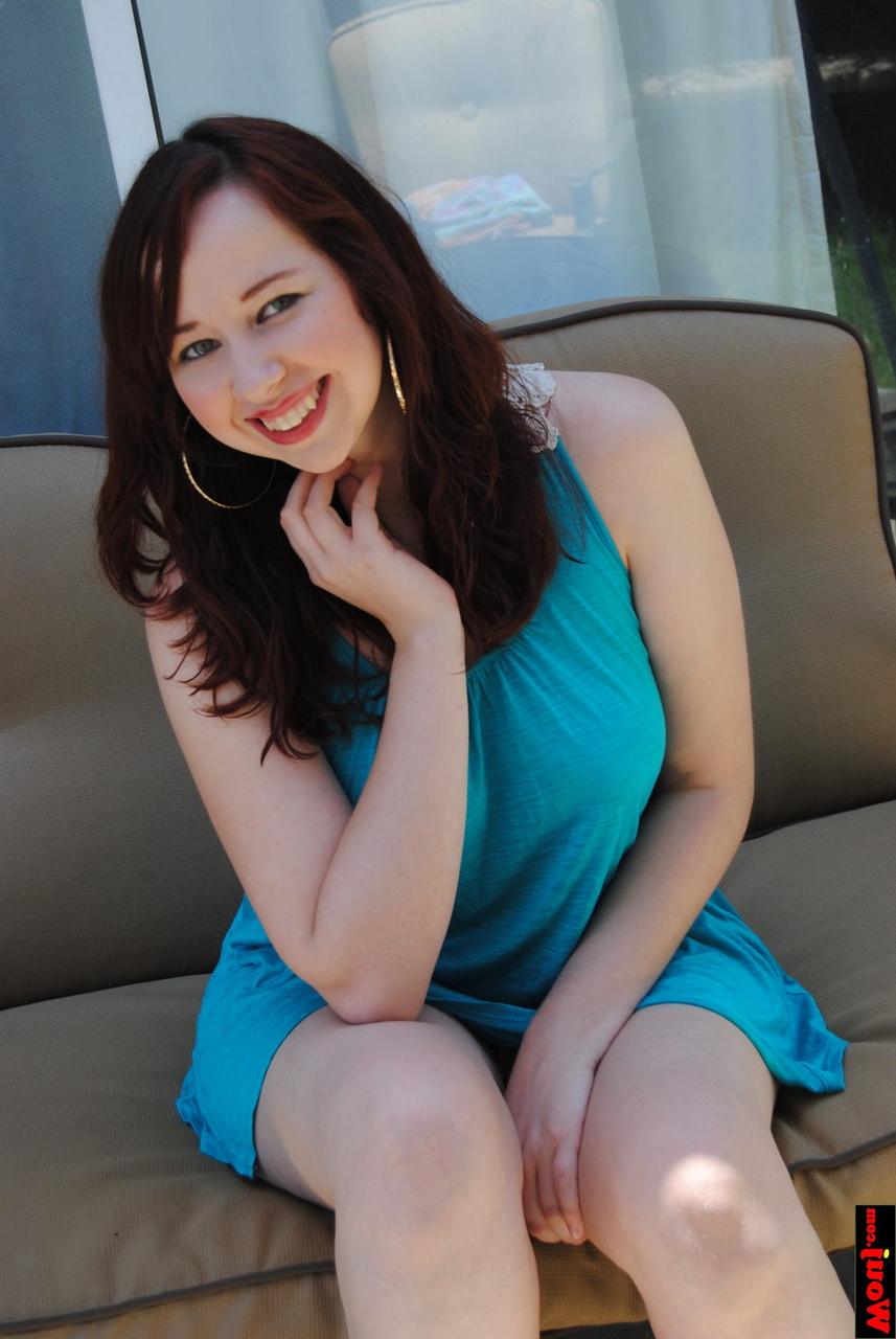 15P Chubby brunette amateur posing in her gorgeous blue dress on the sofa
