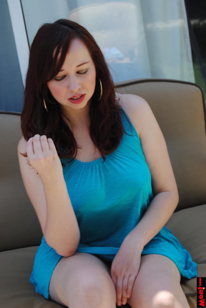 15P Chubby brunette amateur posing in her gorgeous blue dress on the sofa