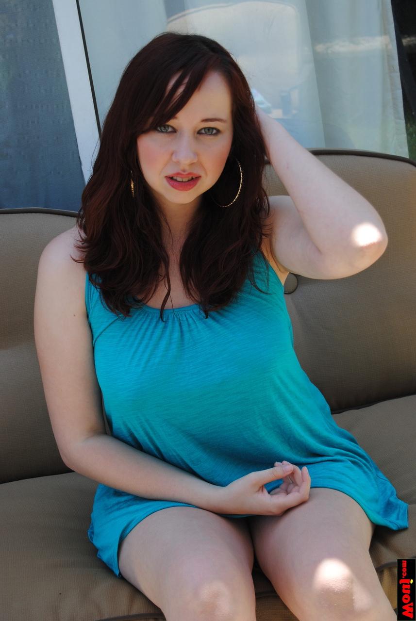 15P Chubby brunette amateur posing in her gorgeous blue dress on the sofa