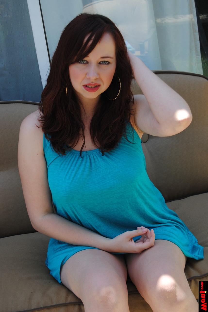 15P Chubby brunette amateur posing in her gorgeous blue dress on the sofa