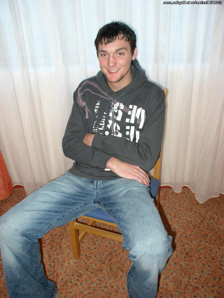 20P Saucy gay brunette Charlie stripping and unveiling his huge hairy dick