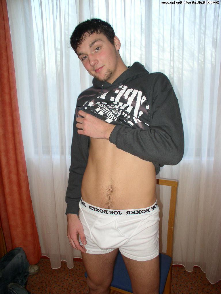 20P Saucy gay brunette Charlie stripping and unveiling his huge hairy dick