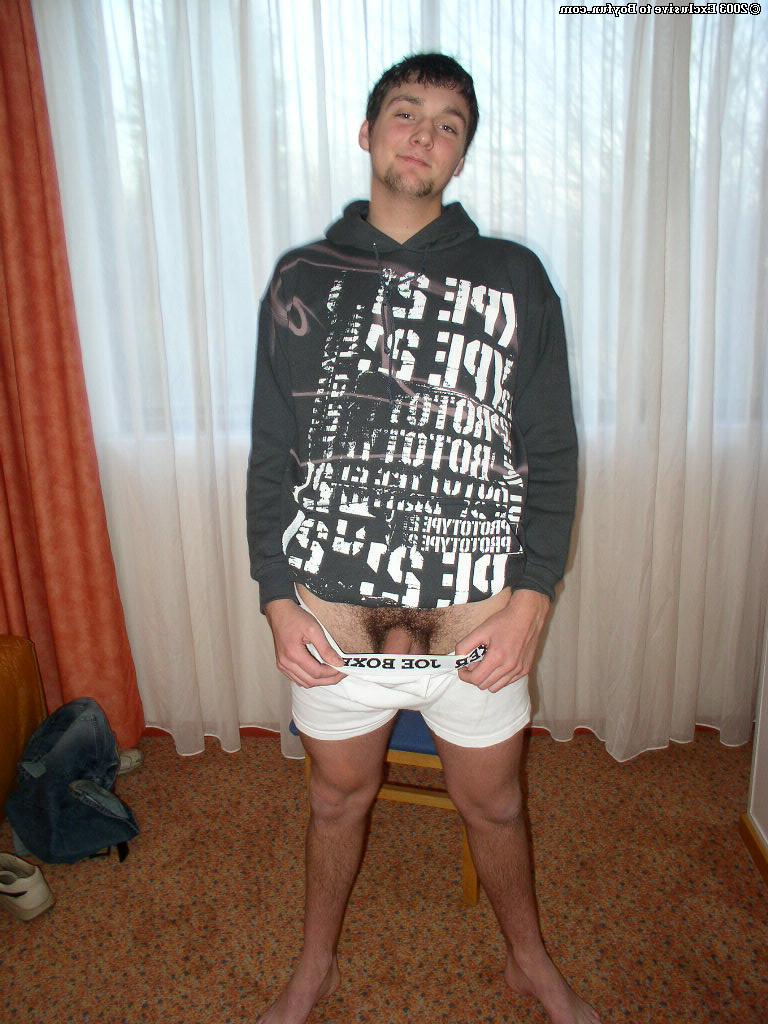 20P Saucy gay brunette Charlie stripping and unveiling his huge hairy dick