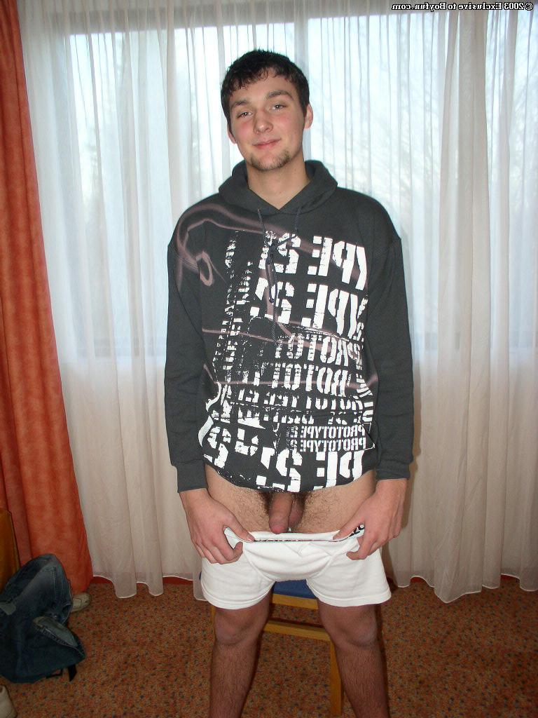 20P Saucy gay brunette Charlie stripping and unveiling his huge hairy dick