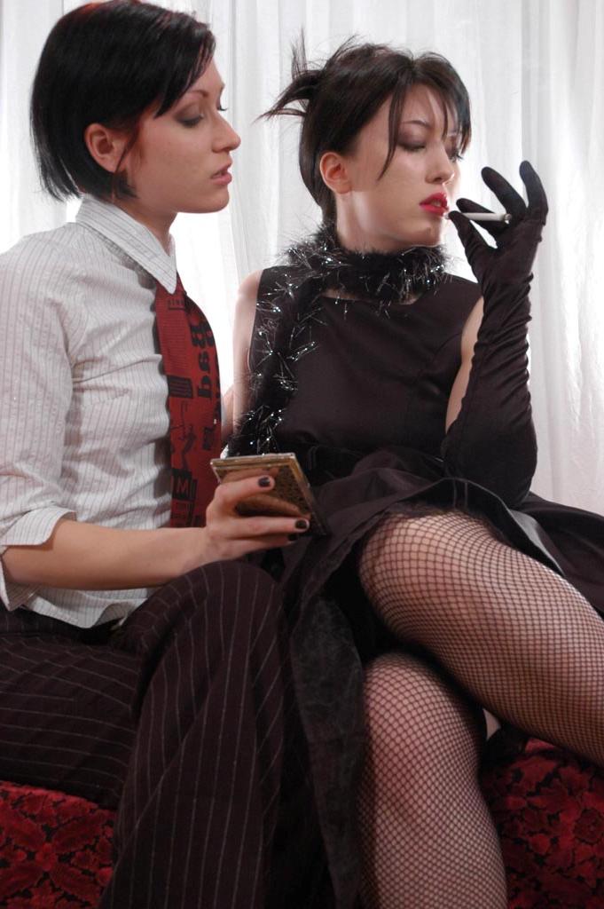 15P Lesbian girls share a cigarette in a provocative manner during non-nude play