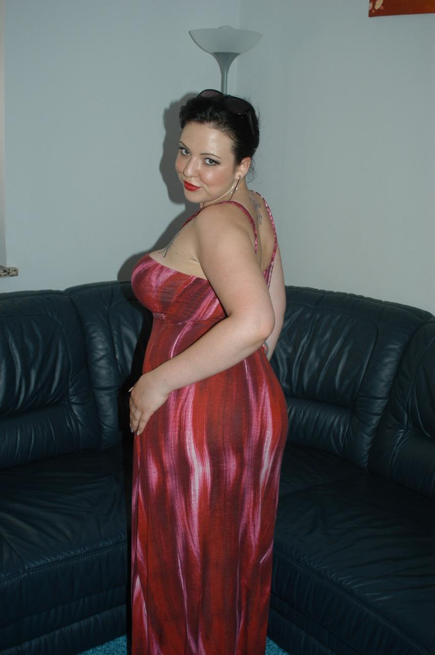 20P Filthy German MILF Pam hikes her red dress up and masturbates with a vibrator