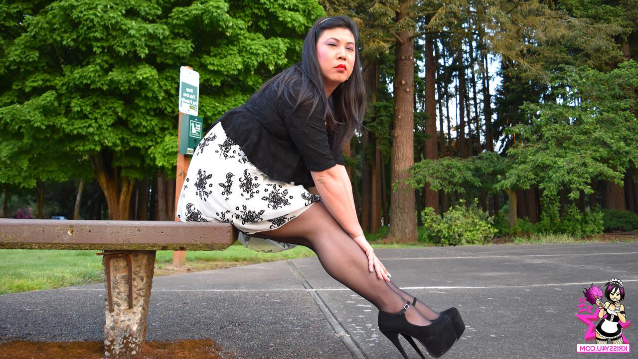 16P Brunette Asian tranny with a fat ass spreads her legs and jerks off her dick