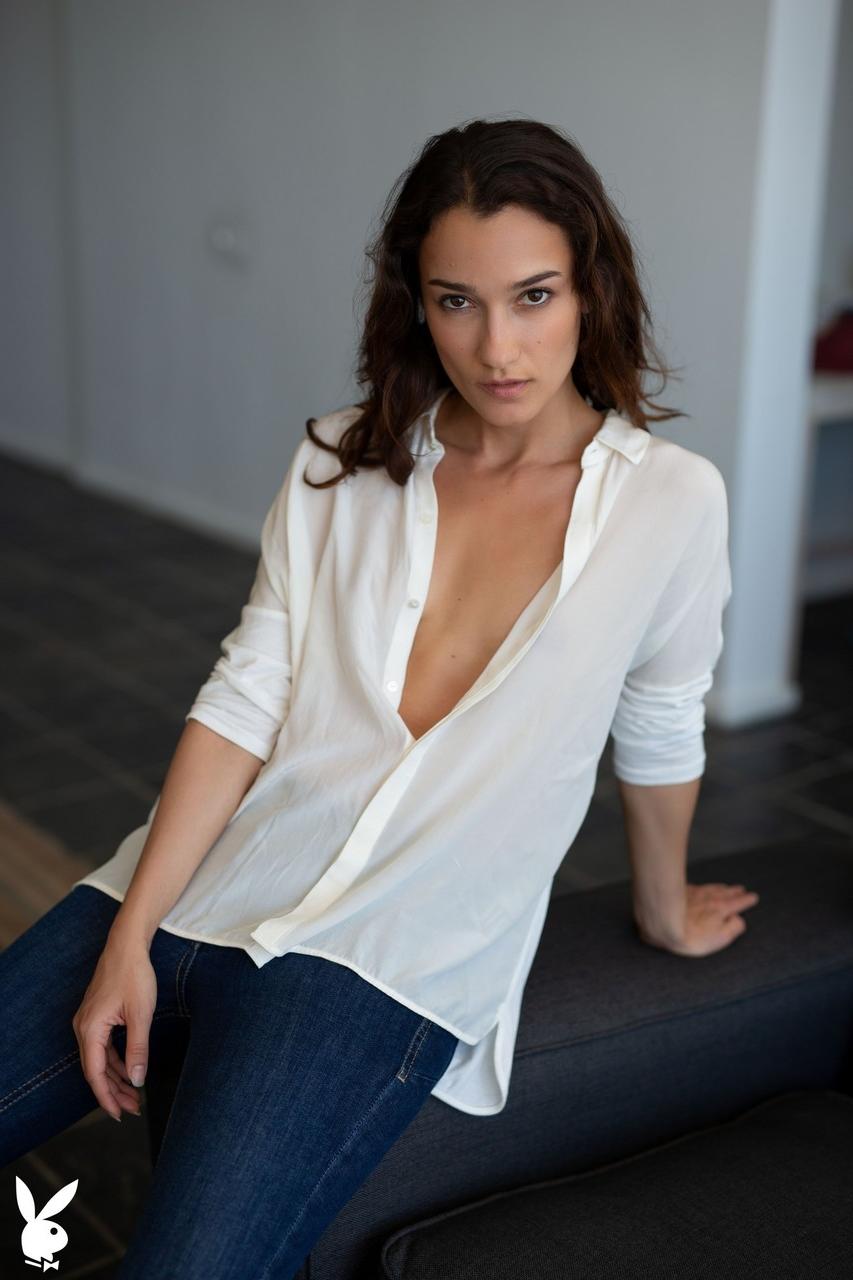 20P Glamorous babe Sofi Ka shows off her small tits in a sexy striptease