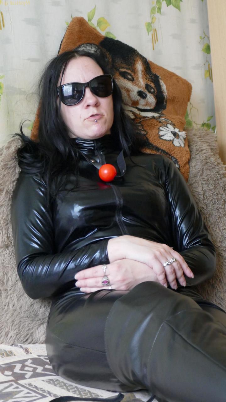 16P Mystical girl models fully clothed in leather apparel and dark sunglasses