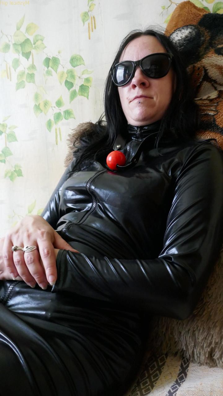 16P Mystical girl models fully clothed in leather apparel and dark sunglasses