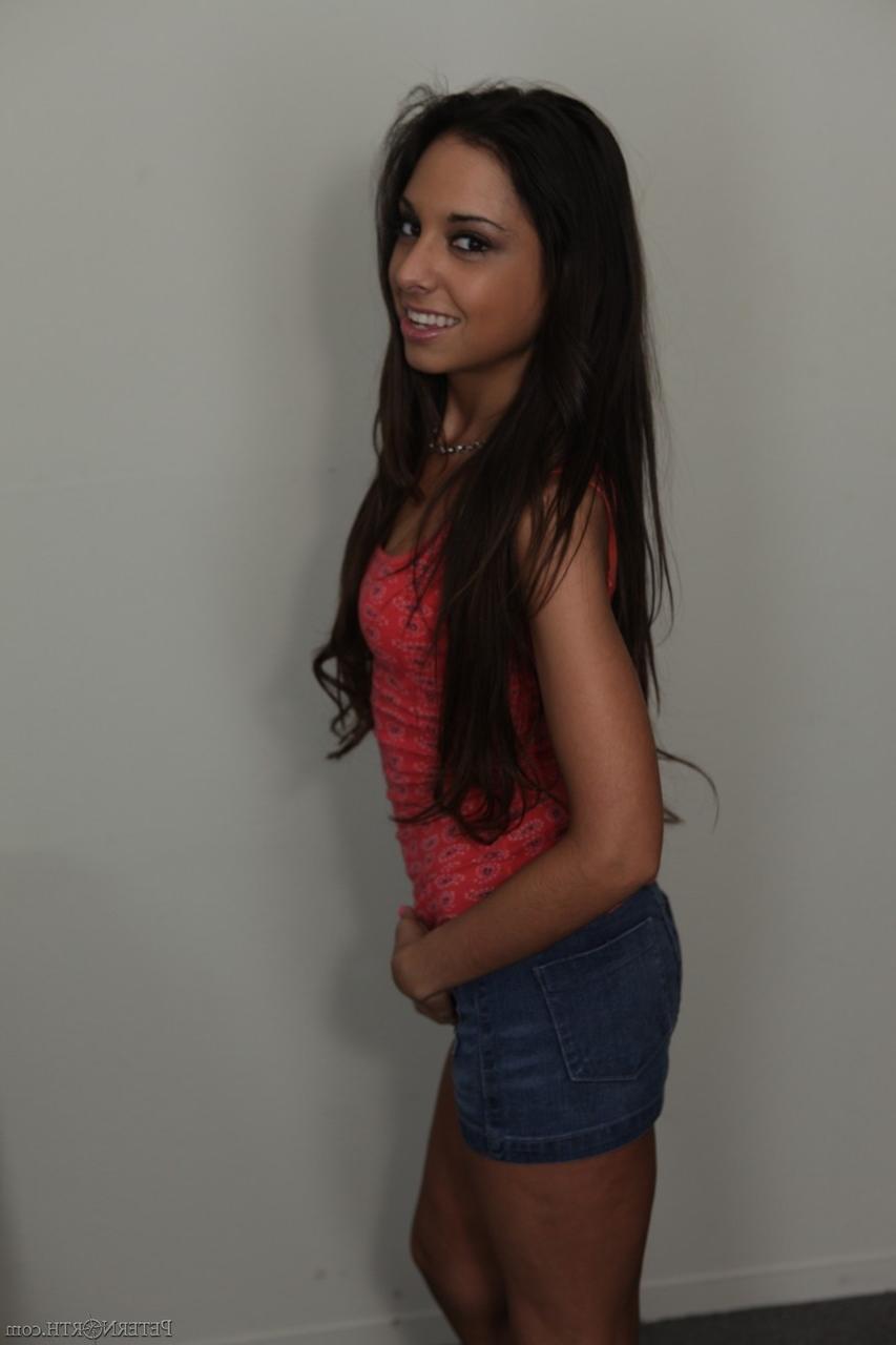 17P Smiley long haired Trinity St Clair shows her tiny tits & a mouthful of cum