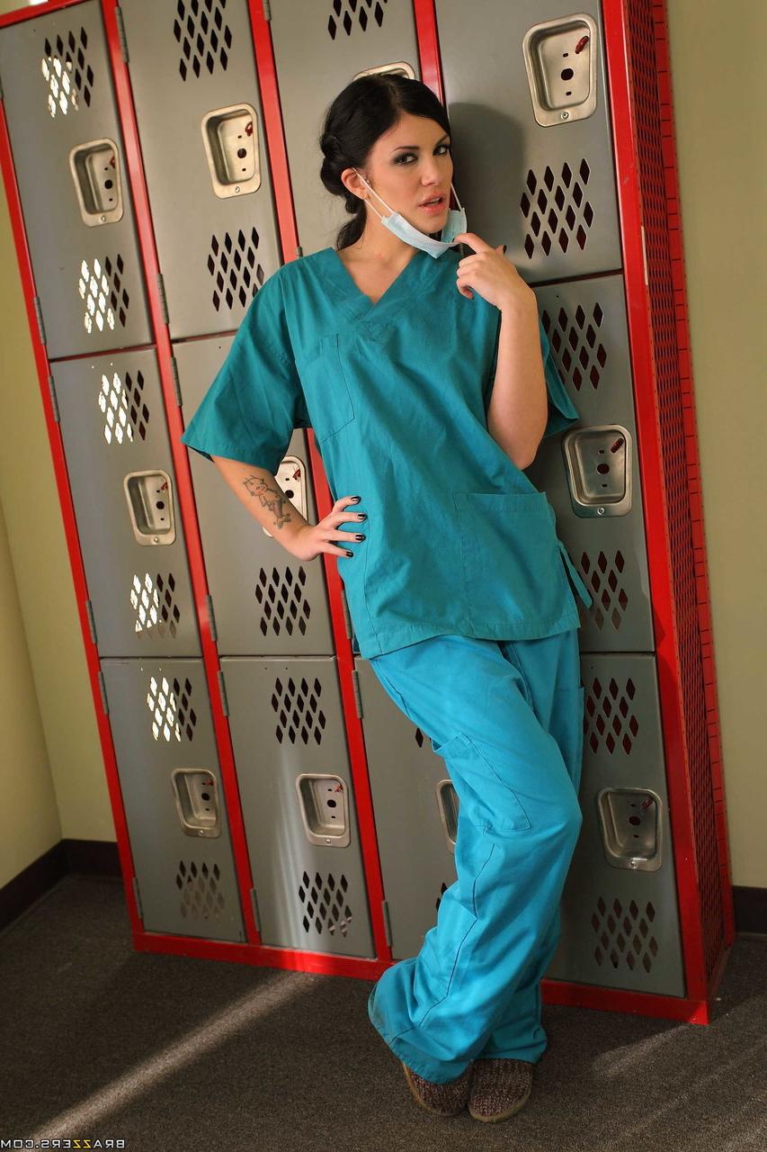 18P Hot nurse Andy San Dimas exposing nice ass after getting naked in a hospital