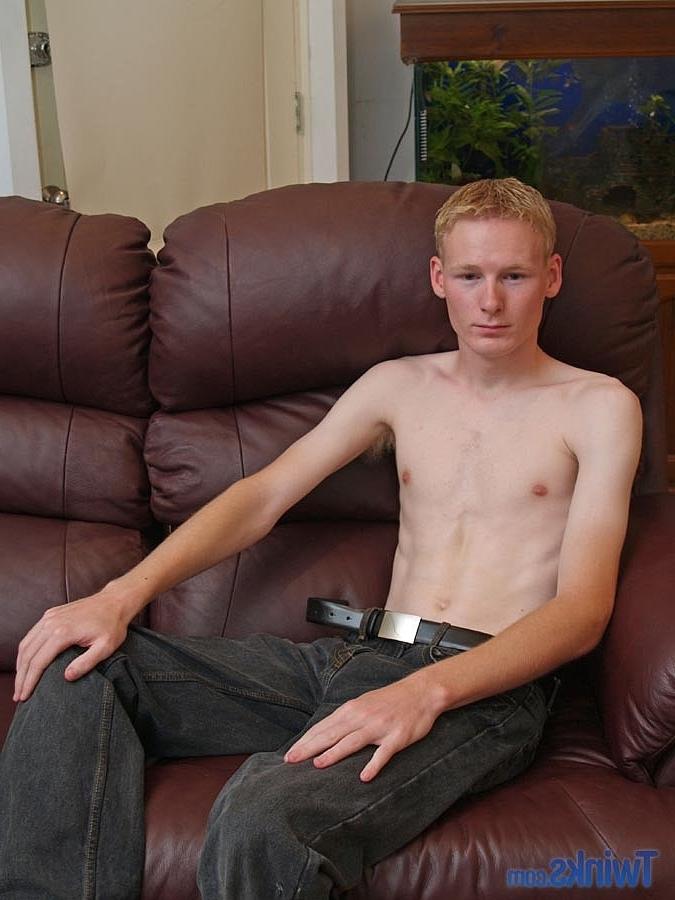 20P Hot twink strips & jerks his small dick until he ejaculates on the couch