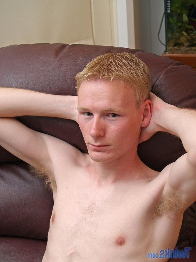 20P Hot twink strips & jerks his small dick until he ejaculates on the couch