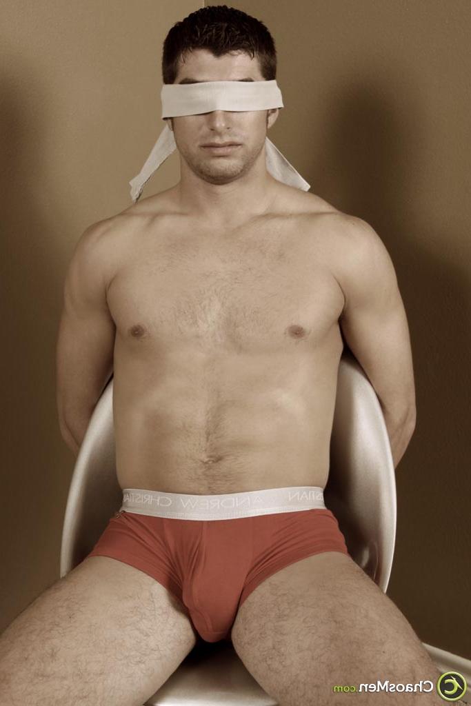 20P Kinky blindfolded gay hunk Ransom gets his dick sucked deeply on a chair