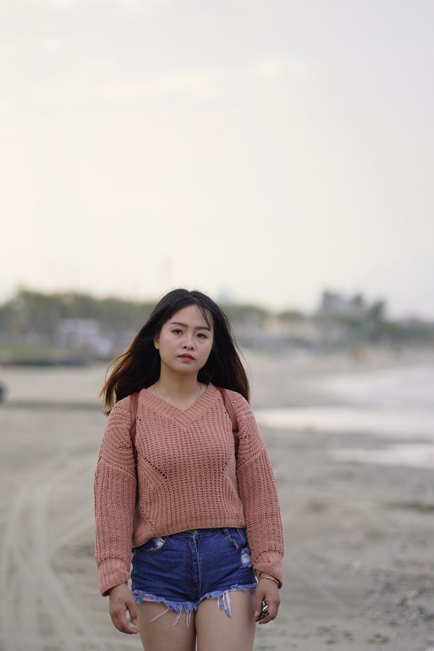 20P Beautiful Asian model poses in her sweater and jean shorts in public