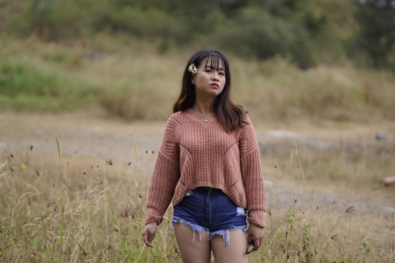 20P Beautiful Asian model poses in her sweater and jean shorts in public