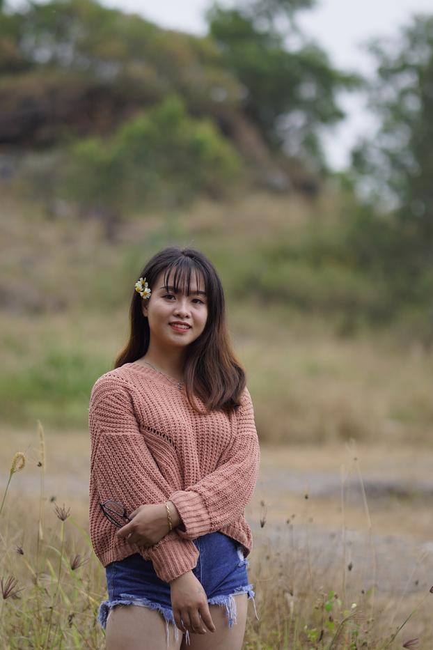 20P Beautiful Asian model poses in her sweater and jean shorts in public