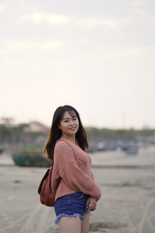 20P Beautiful Asian model poses in her sweater and jean shorts in public