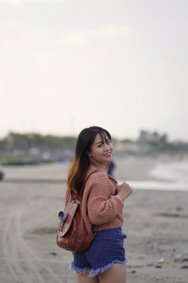 20P Beautiful Asian model poses in her sweater and jean shorts in public
