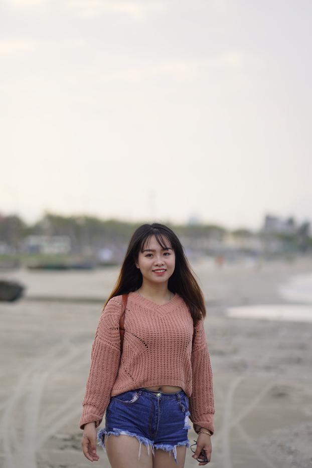 20P Beautiful Asian model poses in her sweater and jean shorts in public