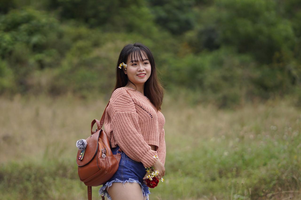 20P Beautiful Asian model poses in her sweater and jean shorts in public