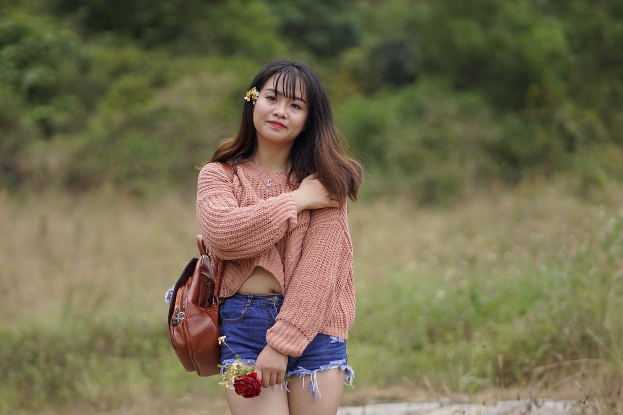 20P Beautiful Asian model poses in her sweater and jean shorts in public