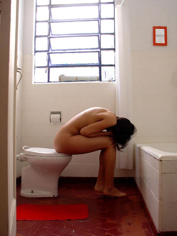 10P Pretty Indian girl is captured in the nude during candid action at home