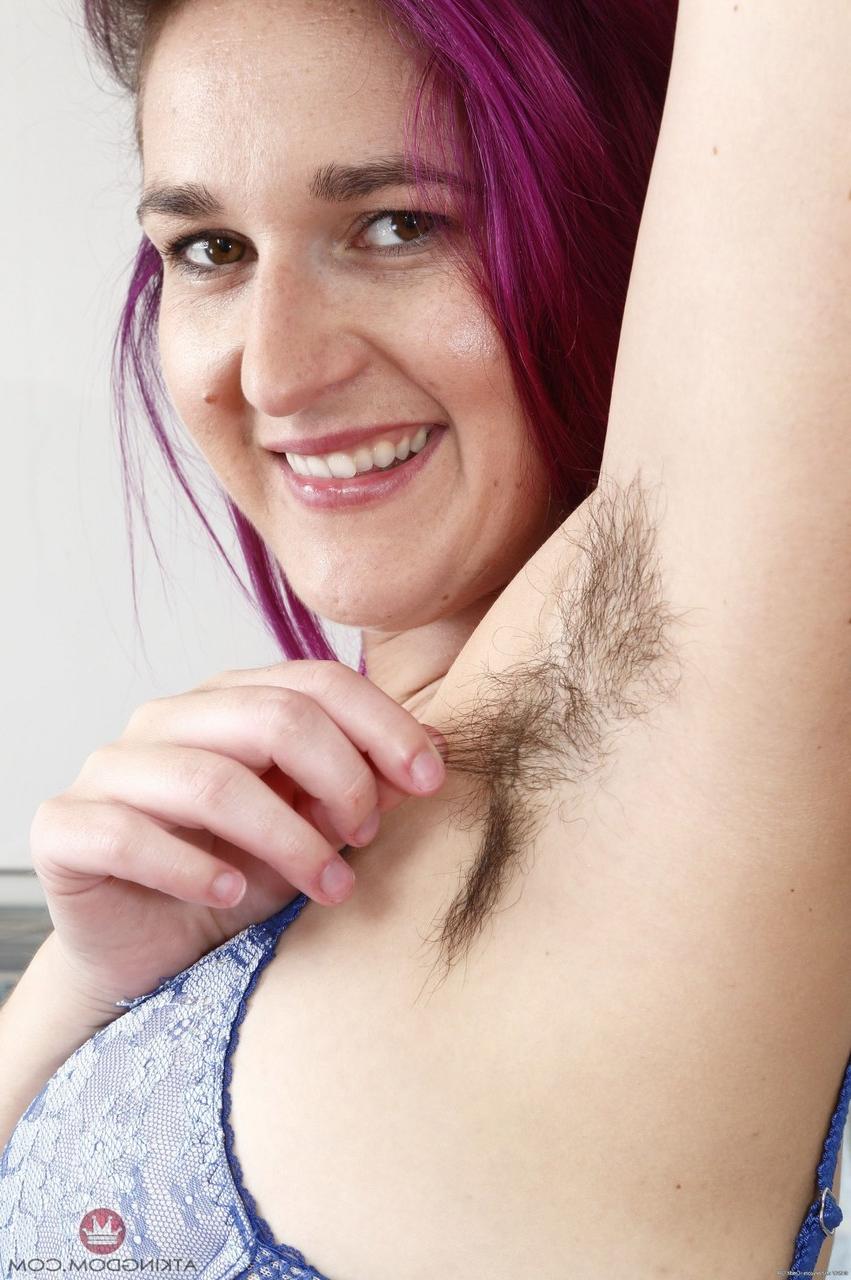 18P Purple-haired bitch KoKo Kitty proudly flashes hairy armpits and bushy crotch